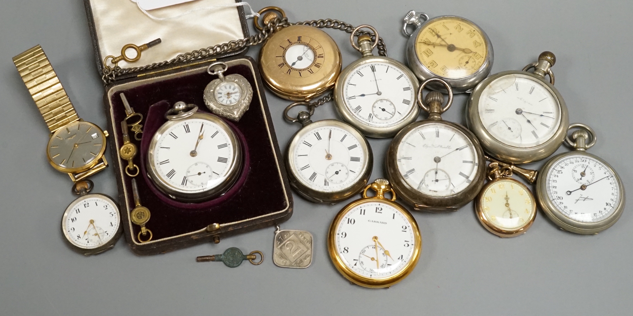 A collection of assorted wrist, fob and mainly pocket watches including Elgin and Garrard.